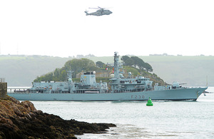 HMS Northumberland, escorted by a Merlin helicopter, arrives in Plymouth [Picture: Leading Airman (Photographer) Ben Shread, Crown copyright]