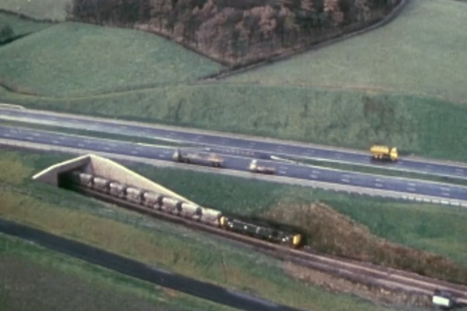 The newly-opened motorway running alongside the main Lancaster to Carlisle railway line 