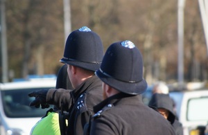 London policemen wearing helmets