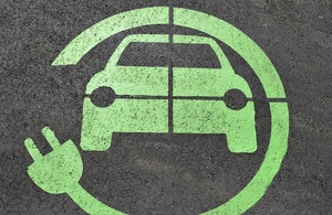 Electric car symbol on tarmac
