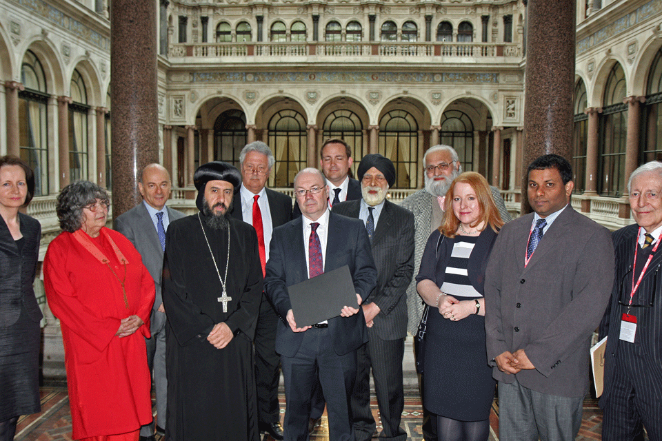 Front row: Ms Fidelma Meehan, National Spiritual Assembly of the Bahá’ís of the UK, Acharya Modgala Duguid, Amida London Buddhist Centre; His Grace Bishop Angaelos, The Coptic Orthodox Church Centre; Foreign Office Minister Alistair Burt; Naomi Long MP; M