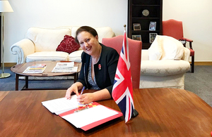 Fisheries Minister Victoria Prentis signs the MoU