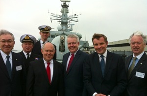 Secretary of State for Wales with representatives of Hitachi and the First Minister of Wales