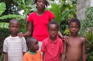 Merancia Michel and her four sons. Merancia is a survivor of human trafficking in Haiti