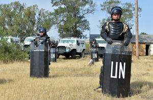 Army reservists from 4th Battalion The Mercian Regiment in protective riot gear training outside Nicosia International Airport [Picture: Corporal Steve Blake, Crown copyright]