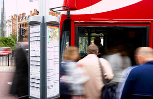 People getting on a bus