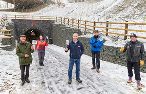 Richard Leafe, Chief Executive of the Lake District National Park, local school children Monty and Holly and Keswick Mayor, Paul Titley, officially opening the new Keswick to Threlkeld Railway Trail with trail users, Keith and Sally Lunsen watching on