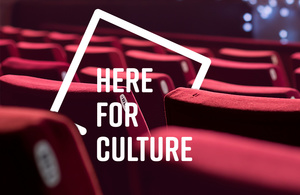 A landscape image of red cinema seat with a white 'Here for Culture' logo