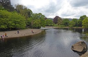 River with people standing on the bank