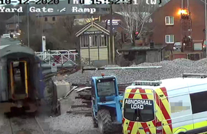 CCTV image showing the rail vehicle moving towards the level crossing gates (courtesy of Mid Norfolk Railway)