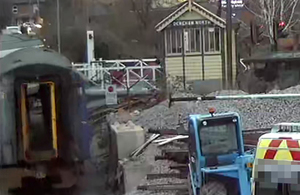 CCTV image showing the rail vehicle moving towards the level crossing gates (courtesy of Mid Norfolk Railway)