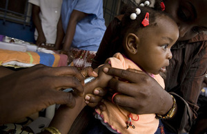 GAVI Alliance: A child receives a vaccine against yellow fever at the Barumbu mother and child center in Kinshasa, DRC. Picture: Olivier Asselin/GAVI Alliance