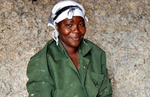 Kenyan farmer Ruth Muthai surrounded by cotton. Picture: AECF