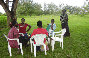 Young women planning a drama based on life themes they chose