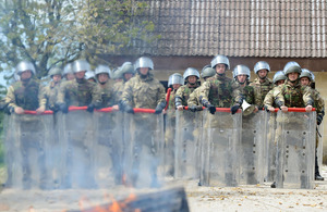 Royal Marines prepare themselves during a public order demonstration [Picture: Corporal Lu Scott, Crown copyright]