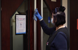 Cleaning the doors in court.