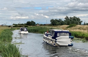 Two boats in East Anglian waterways.