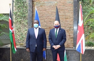 Defence Secretary Defence Ben Wallace stands alongside Dr Fred Matiang’i, Kenyan Cabinet Secretary for the Interior, in front of the Kenyan and British flags