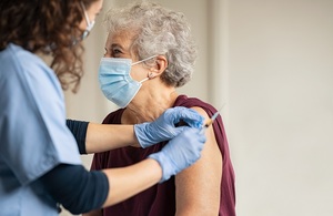 Woman being vaccinated