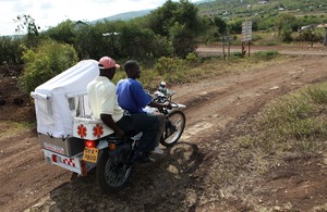 Racing to the rescue: a motorbike ambulance in a remote, rural area of Nyanza province, Kenya. Picture: Caroline Irby / Department for International Development