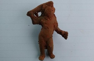 The bronze Cupid figurine that was found