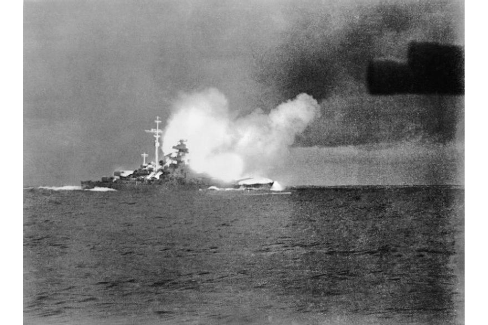 The German battleship Bismarck firing at HMS Hood