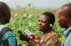 AGFAX journalists interviewing a cassava farmer