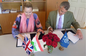 HM Ambassador Robin Ord-Smith (from left) and Tajma Kurt Head of Mission of IOM