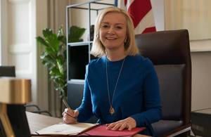 Liz Truss with Trade Act