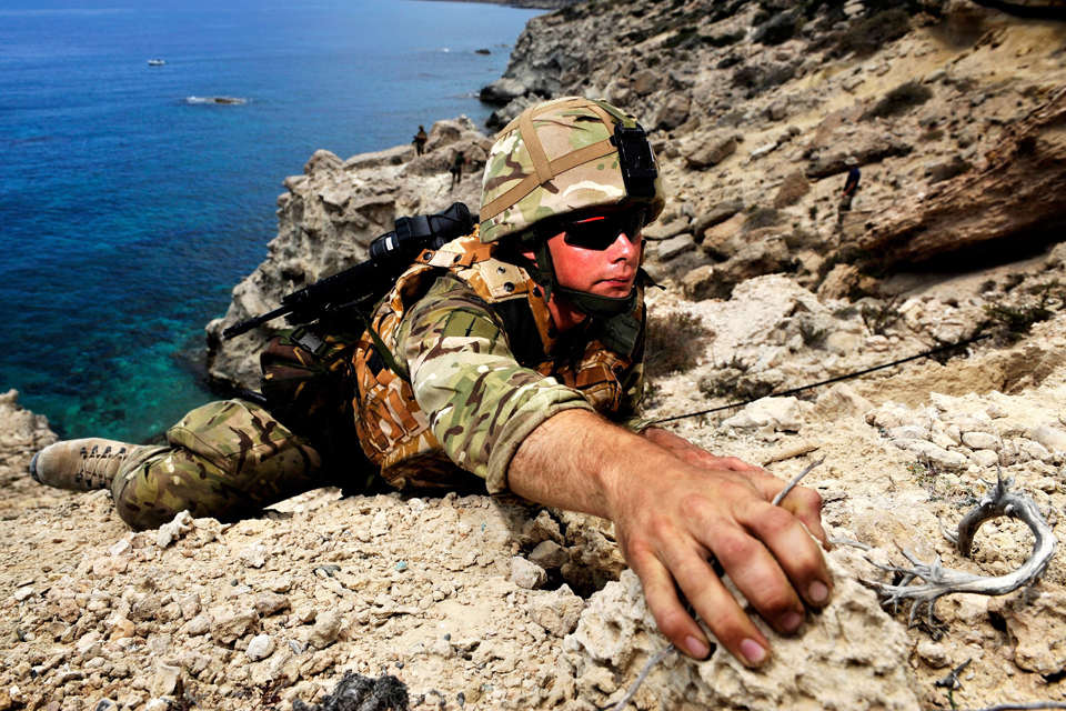 A Royal Marines commando conducting vertical assault training