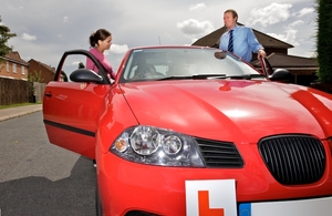 Driving instructor and pupil