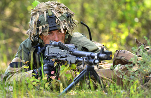 A gunner from 1st Battalion The Princess of Wales's Royal Regiment looks along the sights of a general purpose machine gun [Picture: Corporal Wes Calder RLC, Crown copyright]