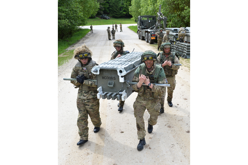 Soldiers build a 5-bay medium girder bridge