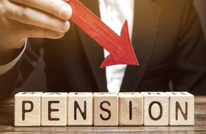 Arrow pointing to wooden blocks spelling out Pension