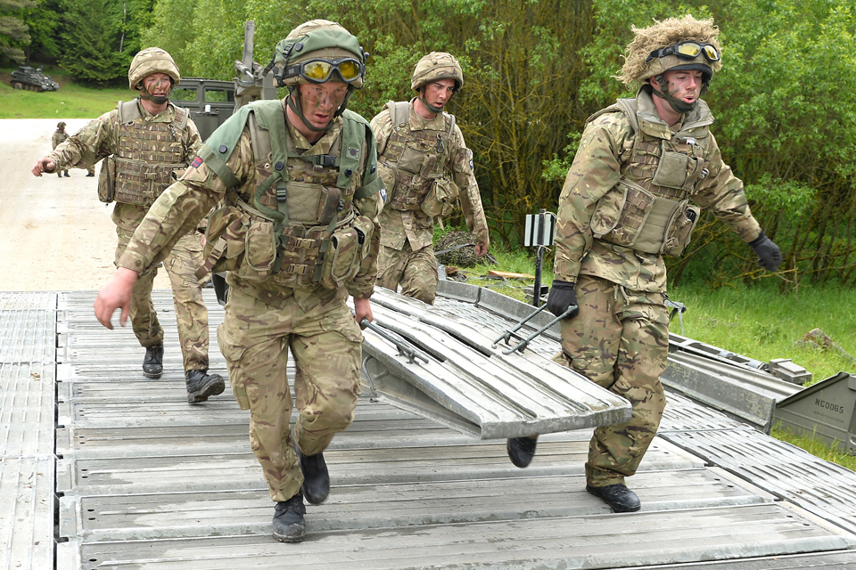 Soldiers build a 5-bay medium girder bridge