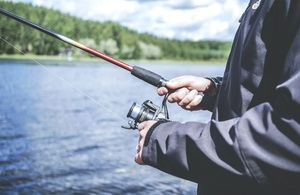 Close up image of a fishing reel