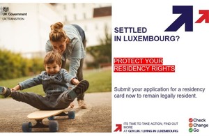 Woman pushing young child on skate board, note to submit residency application in Luxembourg