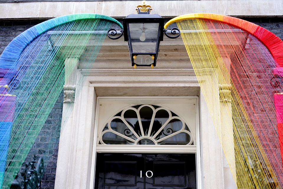 Close up image of the No10 door and the top of the arch of the Pride art installation.