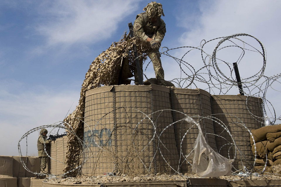 A soldier takes down a security watchtower