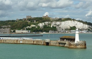Dover harbour with white cliffs in background