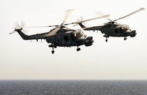 Lynx helicopters fly side-by-side [Picture: Leading Airman (Photographer) Dave Jenkins, Crown copyright]