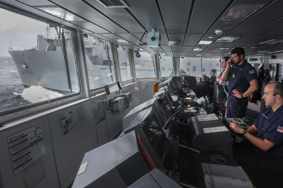 On board HMS Dragon, at sea