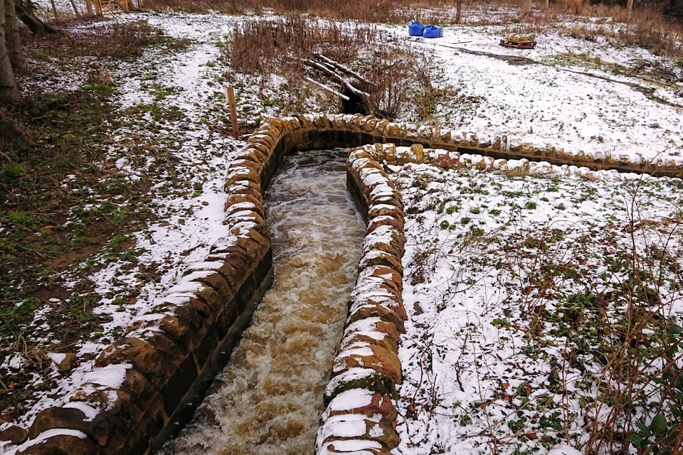 The image shows the completed fish pass on the River Aln 