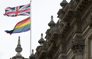 A flag flies for Pride on Whitehall.