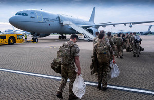 Image depicts personnel boarding an aircraft.