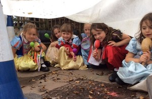 Pupils from the reception class enjoy the newly created den