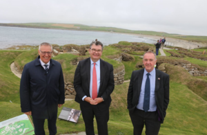 Minister Iain Stewart at Skara Brae with Orkney Councillors