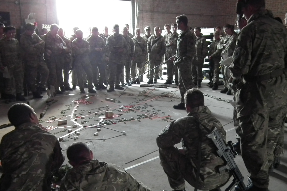 Troops being briefed before taking part in Exercise Wessex Thunder