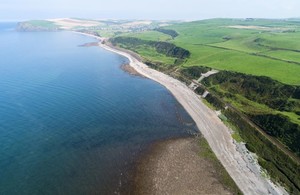 An arial image of the coastline, fields and white beaches are pictured