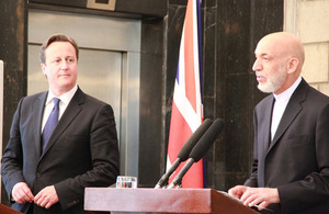 Prime Minister David Cameron and President Karzai holding a press conference.